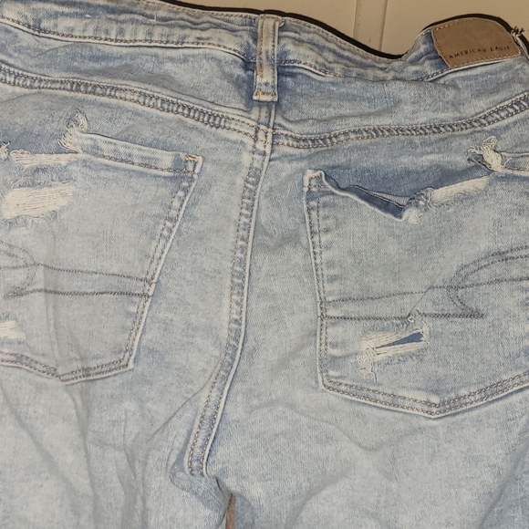 American Eagle Outfitters Destroyed Light Acid Wash Super Stretchy Jeans - Picture 10 of 15